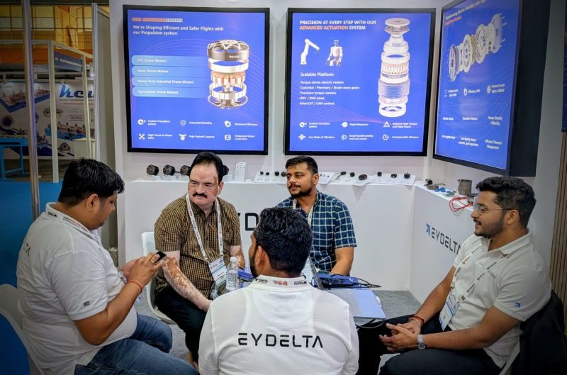 EYDelta engineers talking with visitors on Day 1