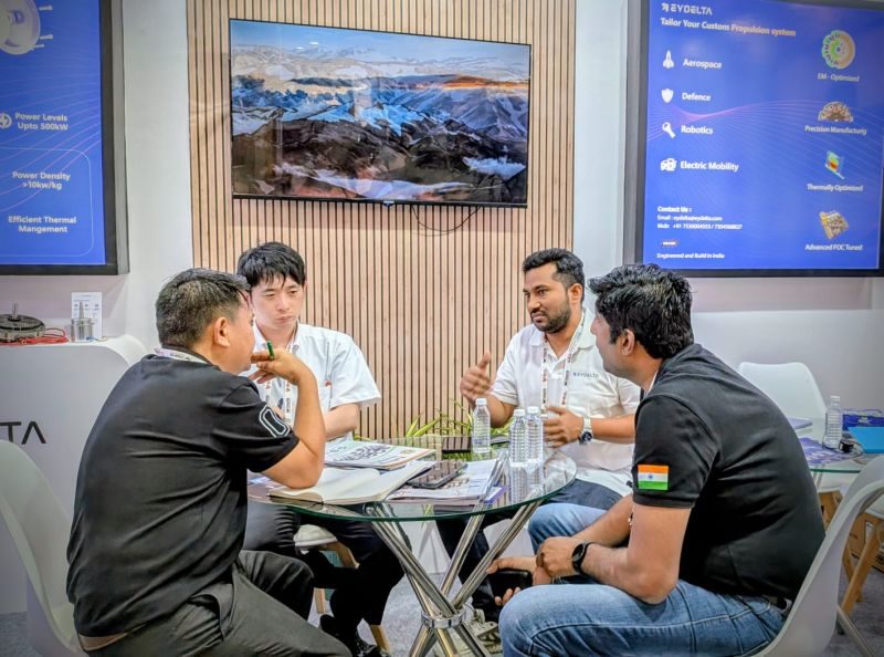 Discussions at the EYDelta booth on Day 2