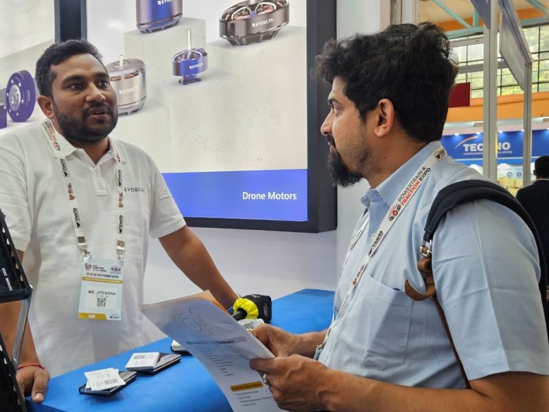 Explaining EYDelta drone motors to a visitor